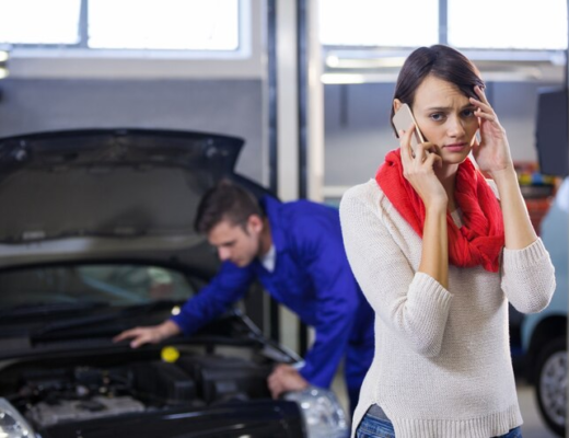 Customer in Auto Servis Talking by Phone