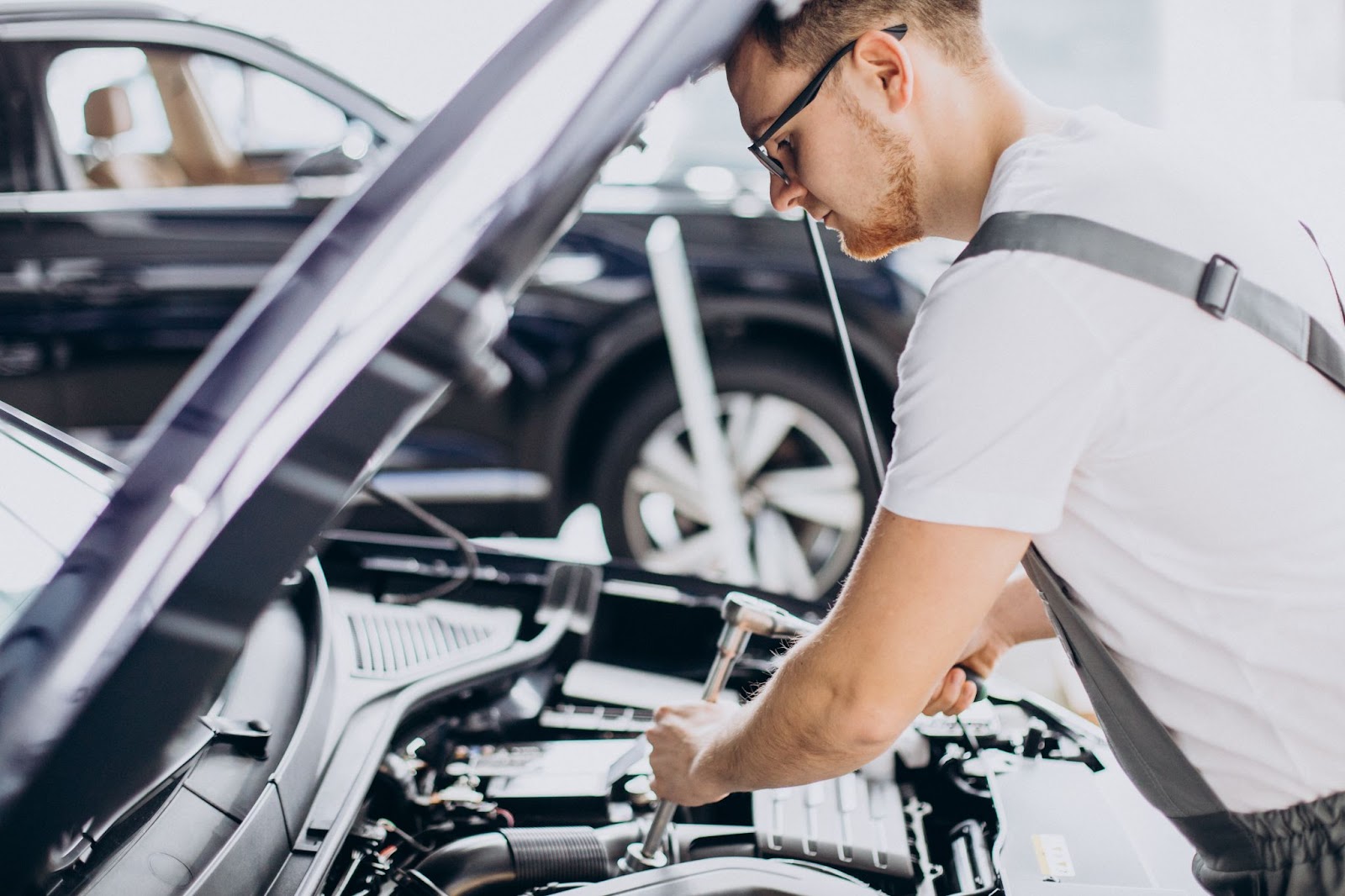 Man repairing a car