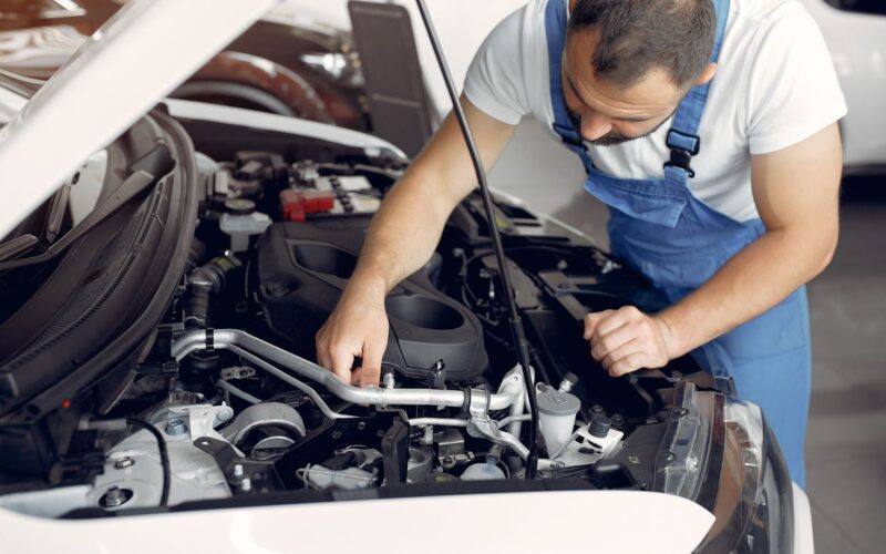 Man repair car engine